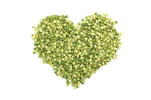 Green split peas in a heart shape Stock Photos