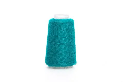 Green spool of thread isolated on white background. Skein of woolen threads Stock Photos