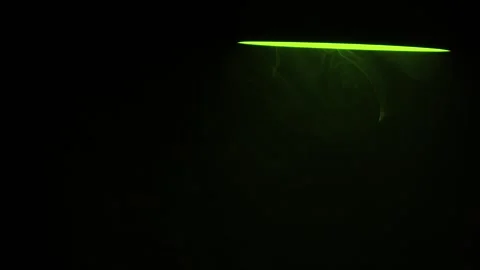 Green Spotlight atmospheric on black Background Stock Footage 340387683