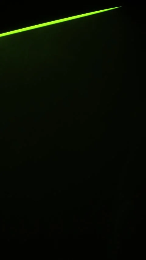 Green Spotlight atmospheric on black Background Vertical Stock Footage 340393018