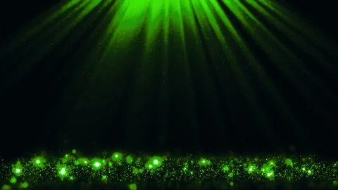 Green spotlights shine down on glowing particles on dark stage Stock Footage 327502096