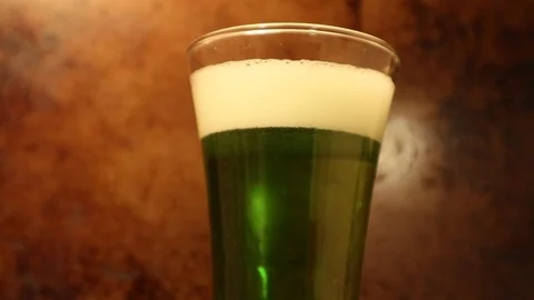 Green St. Patrick’s Beer with Full Head on top Stock Footage 125194641