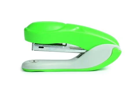 Green stapler isolated on white background Stock Photos
