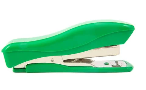 Green stapler on white background Stock Photos
