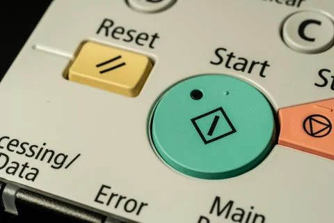 Green start button and other function buttons on control panel Stock Photos
