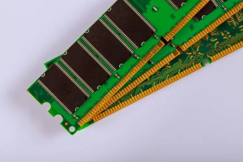 Green stick of RAM memory for computer with electronics components on compute 写真素材