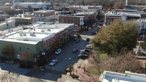 Green Storefront and Square Crosswalks in Downtown Bentonville Stock Footage 121112110