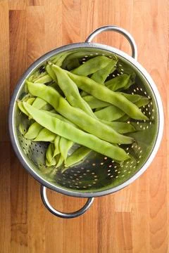 Green string beans pods Cooked green string beans pods in colander. Copyri... Stock Photos