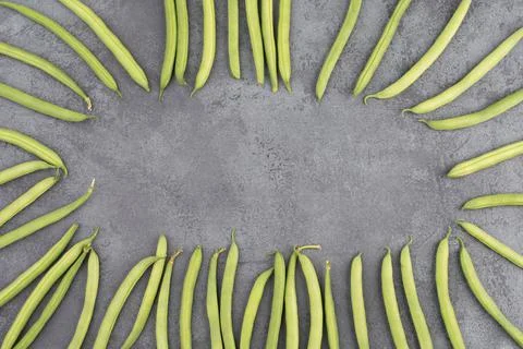 Green string beans on a  textured background, empty space for text, vegetable 스톡 사진