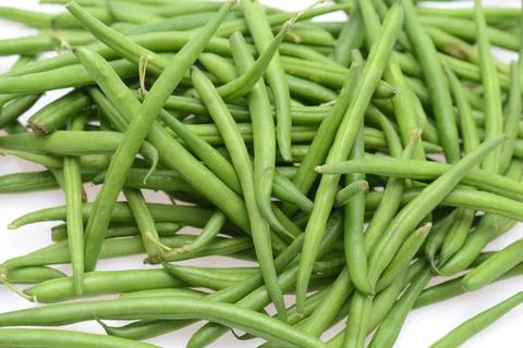 Green string beans on a  textured background, empty space for text, vegetable 스톡 사진