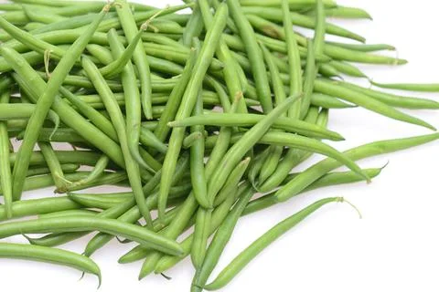 Green string beans on a  textured background, empty space for text, vegetable Foto stock
