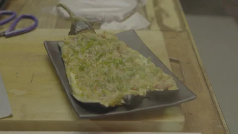 Green Stuffed Dish Stirred On Black Plate Stock Footage 346223505