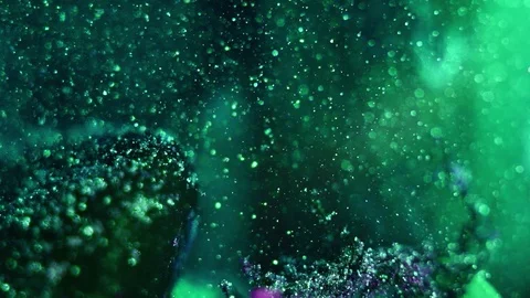 Green substance with bubbles rising Stock Footage 122376313