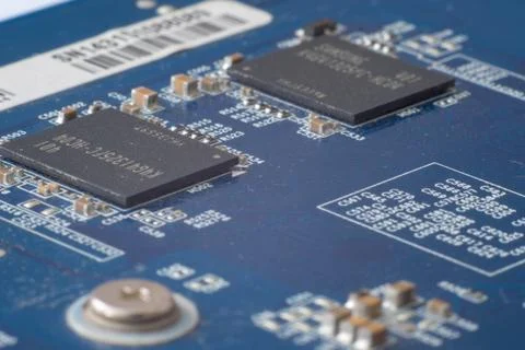 Green system board with microchips and transistors Foto stock