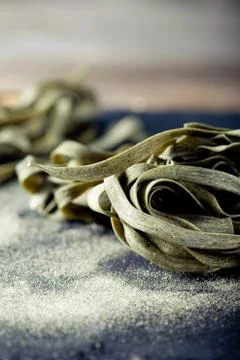 Green tea and sea weed pasta on a stone plate Stock Photos