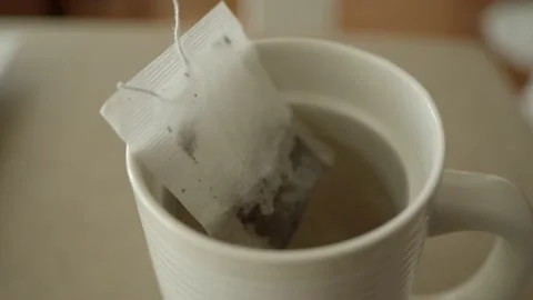 Green Tea Bag Placed in Cup Video stock 149930310