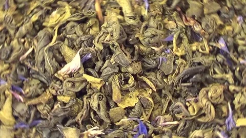 Green tea with bergamot rotating, close up overhead view Stock Footage 71981431