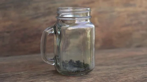 Green tea brewing process on a wooden background Stock Footage 71824886