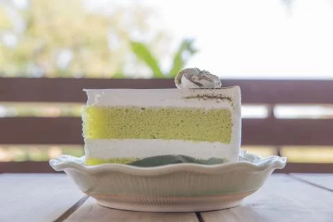 Green tea cake on the table Stock Photos