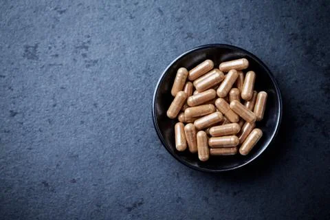 Green Tea capsules. Stock Photos