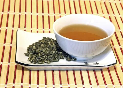 Green tea in a cup Stock Photos