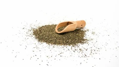 A green tea leaf on a white background. Stock Photos