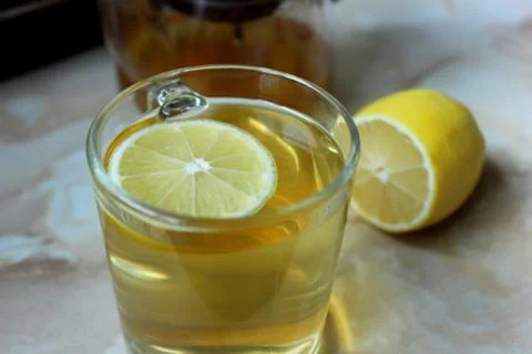 Green tea with lemon Stock Photos