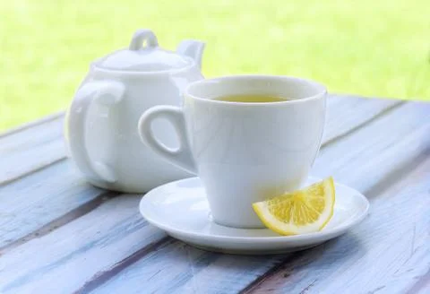 Green tea with lemon. Stock Photos