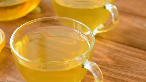 Green tea with mint, rose, goji berries, pineapple and honey Stock Footage 73603275