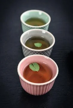 Green tea in  small cups Stock Photos