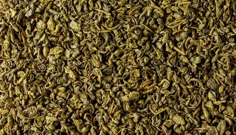 Green tea with susep texture background. Tea dried. Tea background Stock Photos