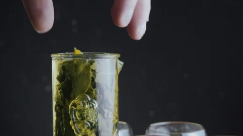Green tea in a tea flask. Water is poured out, tea. There is steam. Tea ceremony Stock Footage 89098780