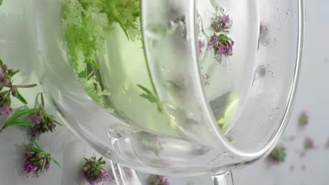 Green tea with thyme.vertical.close-up. Stock Footage 310131669