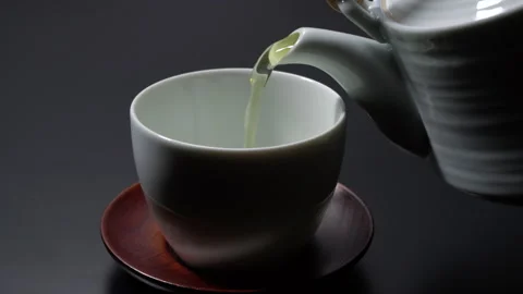Green tea on a white background. Image of Japanese green tea Video stock 140774249