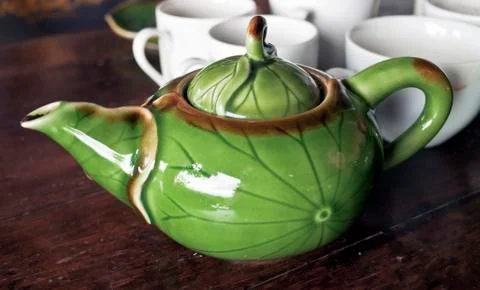 Green teapot Stock Photos