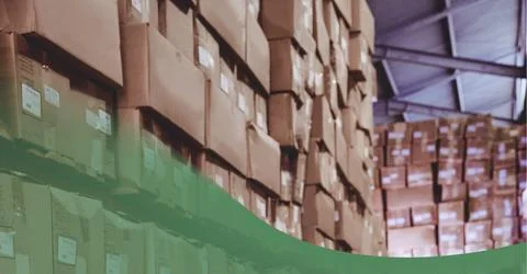 Green technology background over stack of cardboard boxes in the warehouse Stock Photos