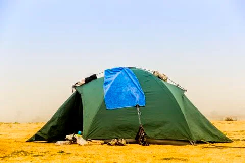 Green tent at the beach Stock Photos