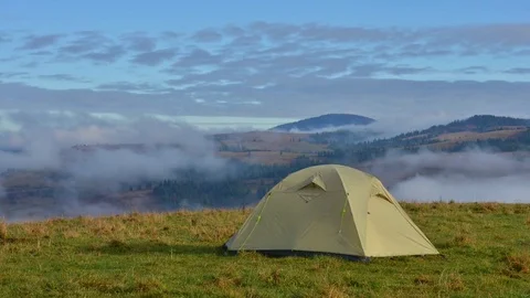 Green tent in high mountains Stock Footage 81801541