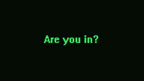 A green text, "Are you in?", is printed on a black computer screen. Stock Footage 328817823