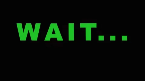 Green text WAIT message appearing on black background with cinematic motion.. Video stock 343407973