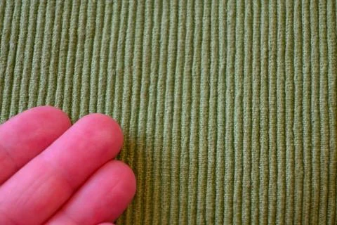 Green Textile Background with Hand – Minimal Natural Fabric Texture Concept Fotos Stock