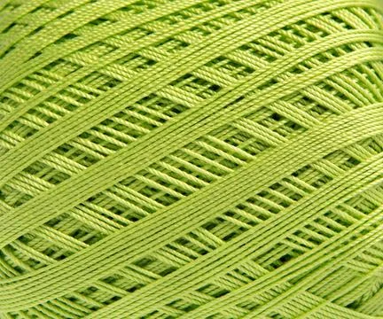 Green textured cotton thread  background, rows of yarn for knitting forming.. Fotos Stock