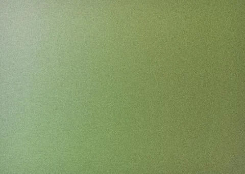 Green textured surface with gradient light effect on left side Stockfoto's