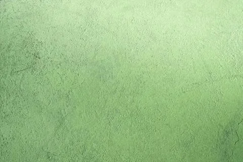 Green textured wall background for design and art projects Stock Photos