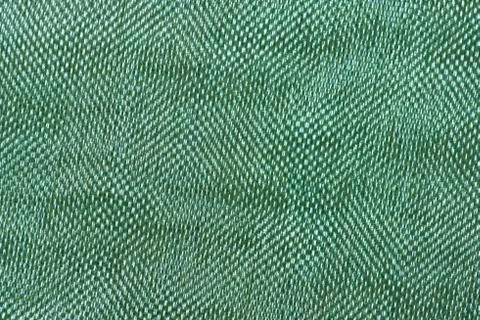 Green thread fabric pattern macro closeup 写真素材