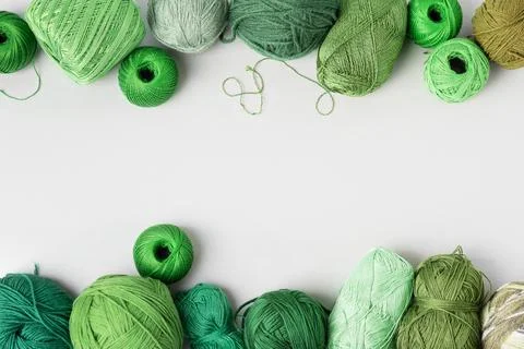 Green threads for knitting Stock Photos