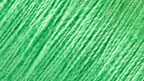 Green threads, textile material Stock-Footage 207802251