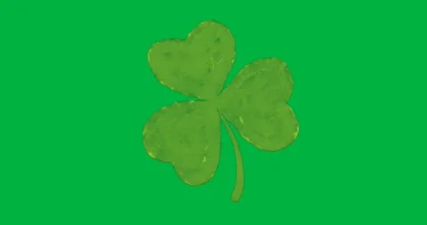 Green three-leaf clover graphic floating on transparent background, showcasing Stock Footage 317479422