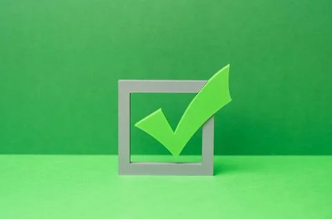 Green tick checkmark for voting in elections. Passed the test, completed th.. Foto stock