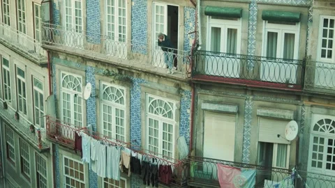 Green Tiled Facade With Drying Laundry Stock Footage 327687542